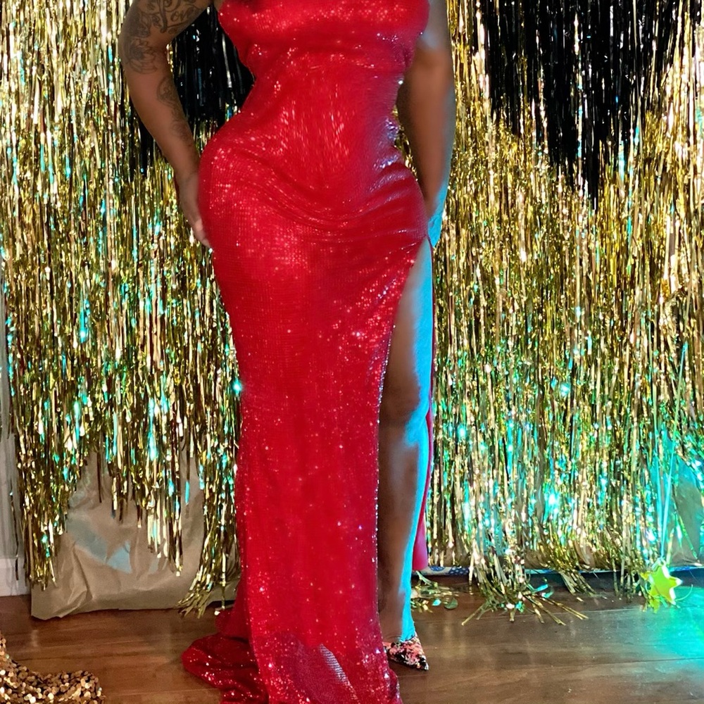 Red sequin gown with high slit